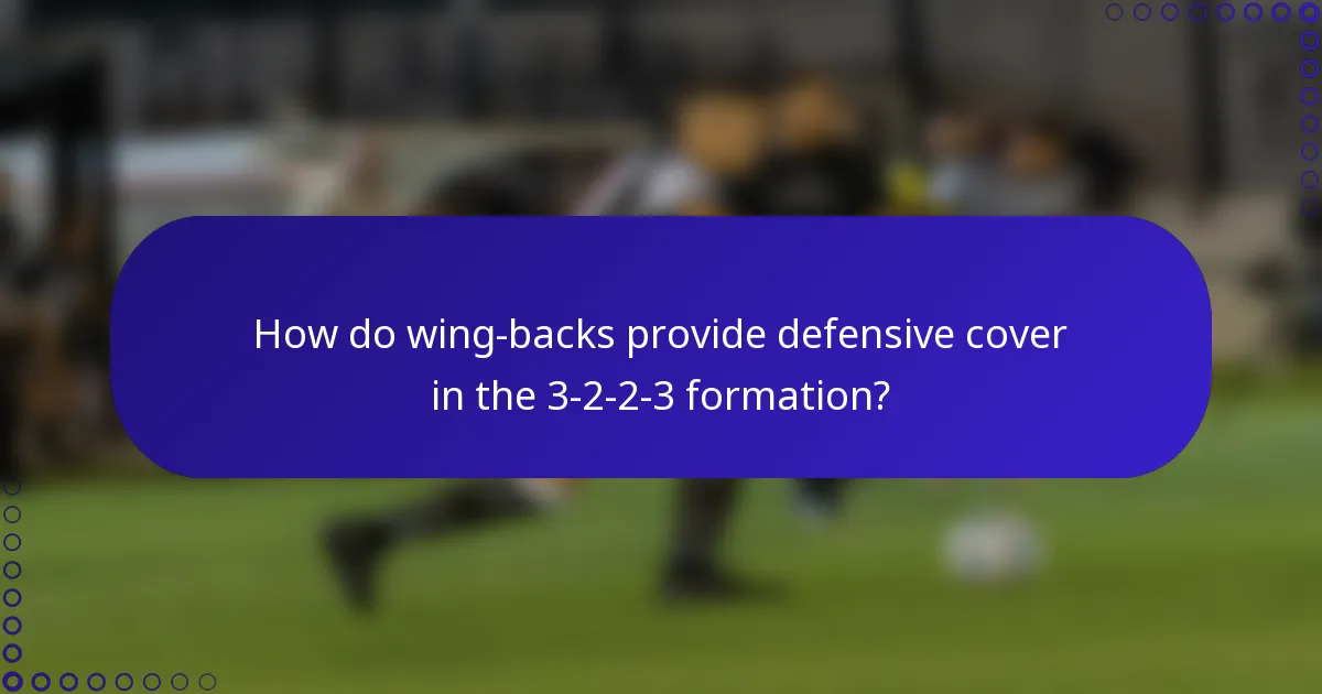How do wing-backs provide defensive cover in the 3-2-2-3 formation?